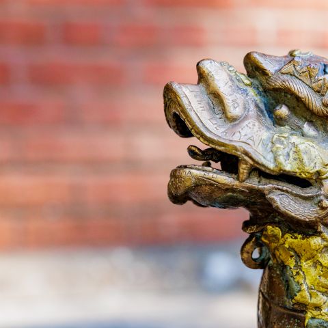 Boxer I statue on brick background
