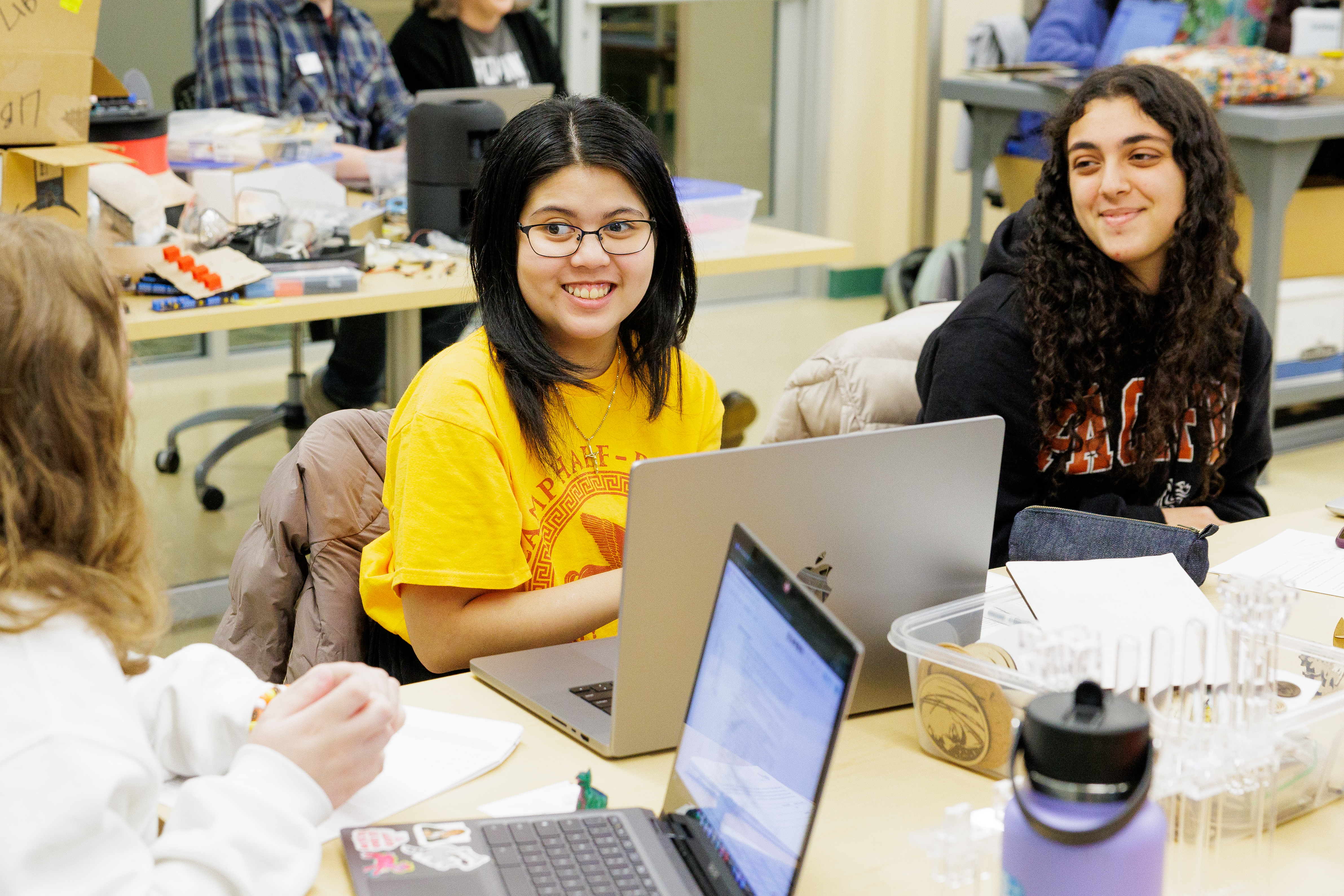 Pacific undergraduate students meet to discuss coursework in the on-campus Boxer Makerspace.