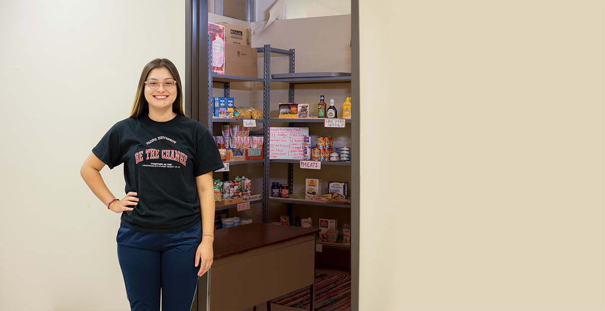 Ruth Gomez '19, Stands in front of the Boxer Food Share