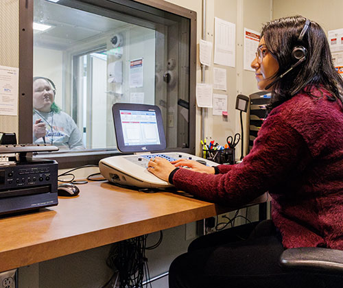 School of Audiology Students Conducting Hearing Test