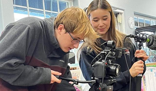 Benjamin Martin (left) and Shinia Kildall Behind Video Camera