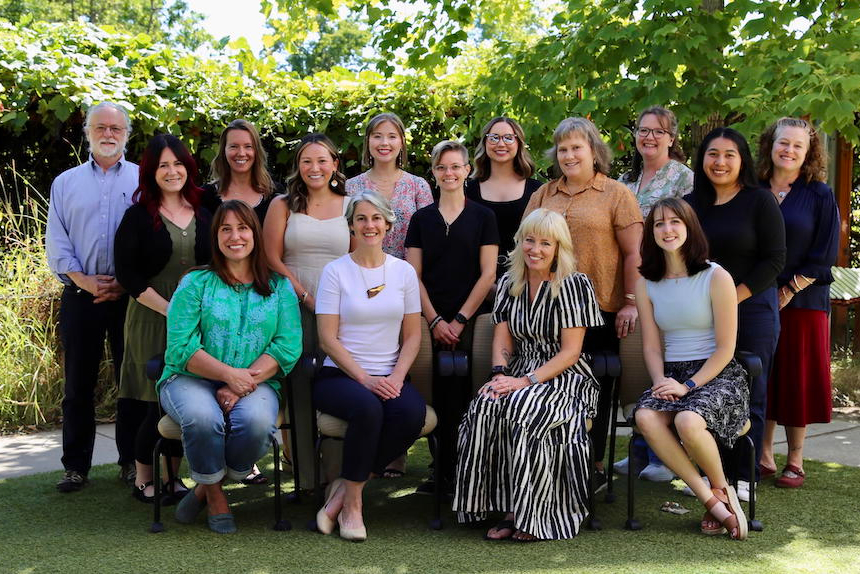 ELC teachers gather outside for group photo.