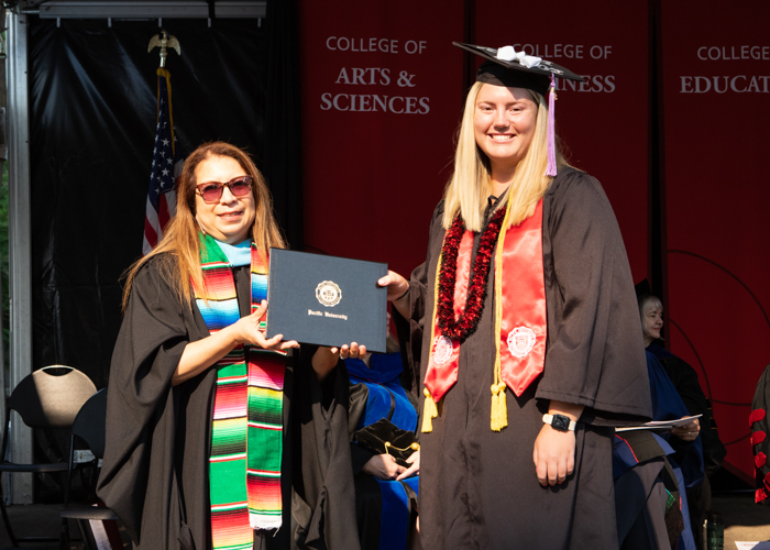 Danielle Hobbs receives award at August commencement