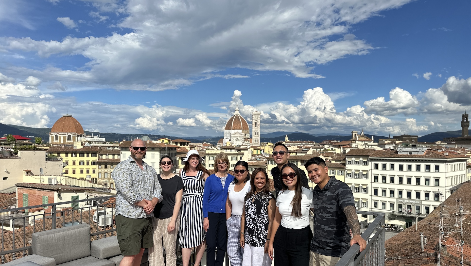 Pacific MBA students in front of a cityscape