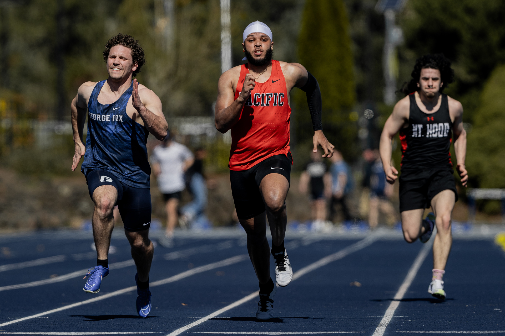 A Pacific student competes with regional students in a track meet