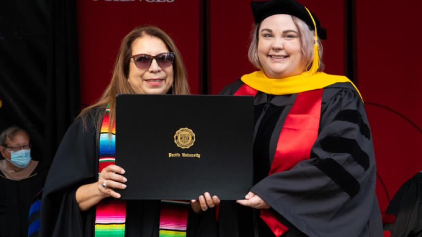 Molly Young receives award at August commencement