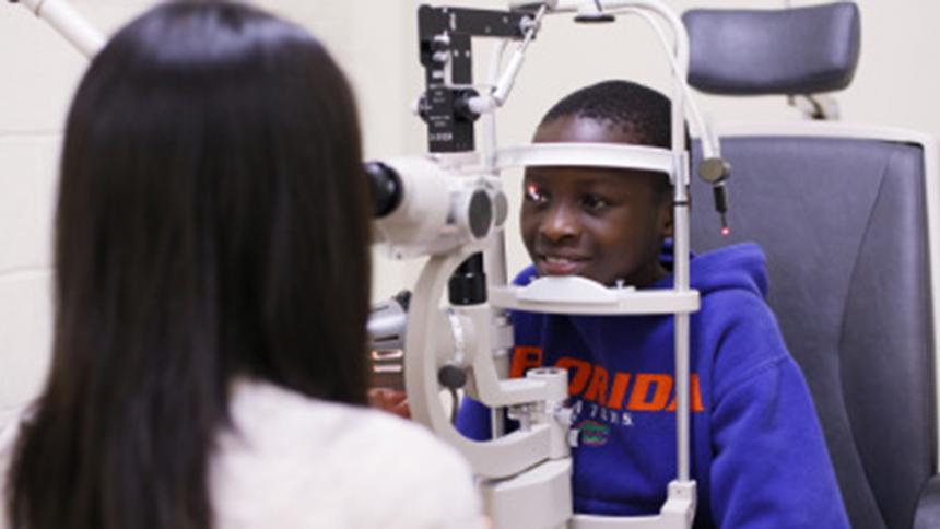 Young child receiving an eye exam.