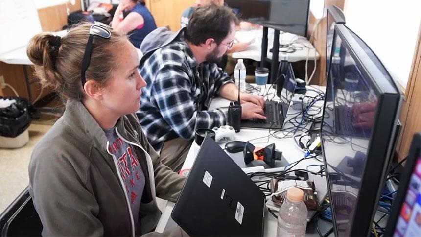 Maggie Wigness '10 Sitting In Front Of A Computer