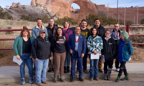 Students pose with the president of the Navajo Nation