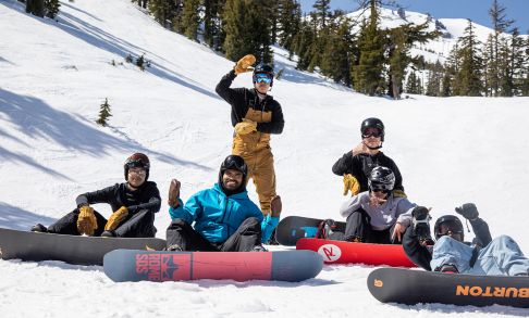 Vámonos Outside participants tubing in snow