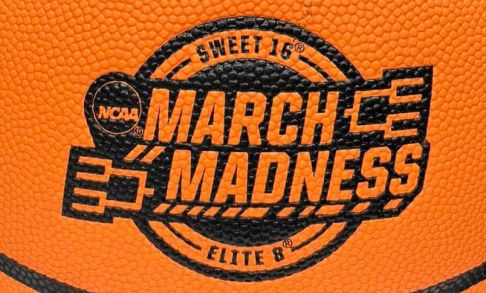 March Madness Logo Stamped On A Basketball