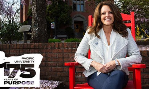 Jenny Coyle President sitting on a chair with 175 wordmark