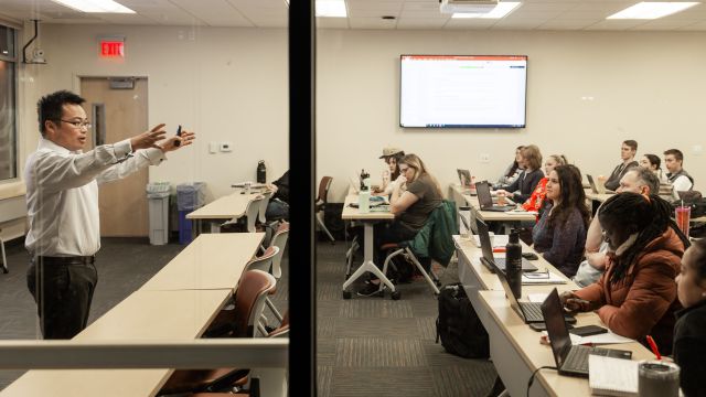 A professor addresses students in Pacific's MBA program