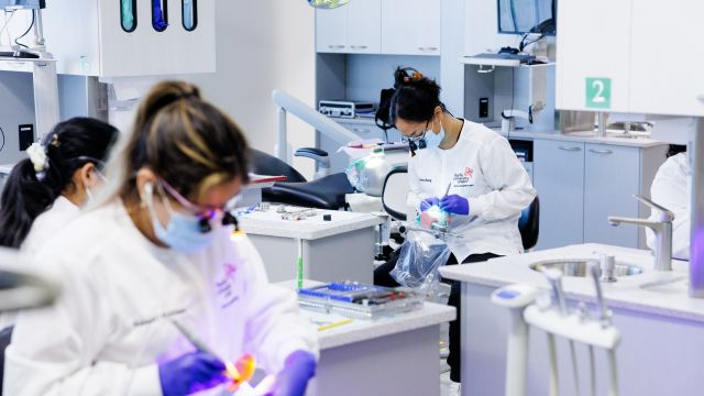 Students provide care in the dental hygiene clinic at Pacific University