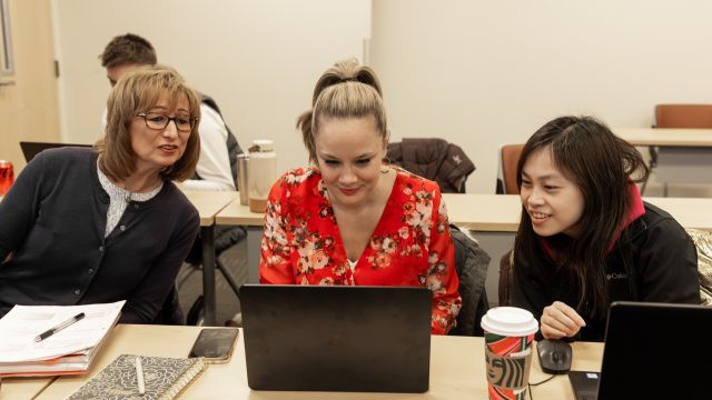 MBA students collaborate during class at Pacific University