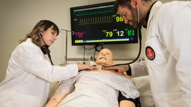 Physician assistant students practice in the SIM Lab