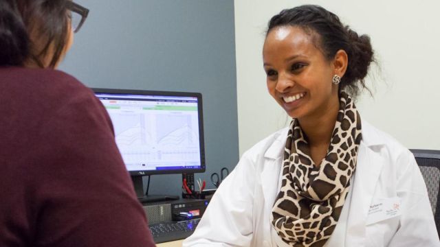 audiologist conducting test