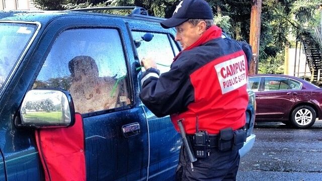 campus public safety officer opening a locked-out car