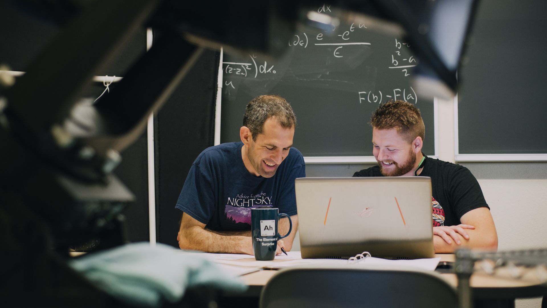 Astrophysics professor and student working together