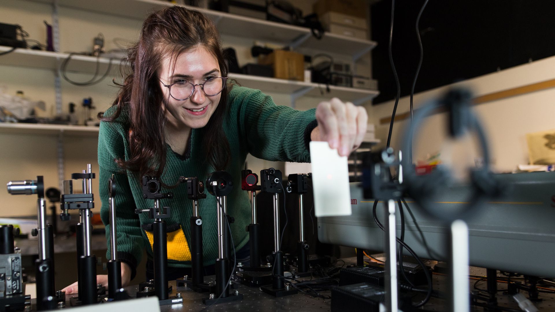 student performing physics experiment